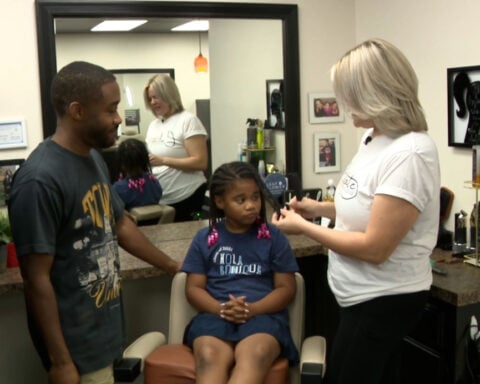 Salon owner hosts “Dads do Hair” workshop