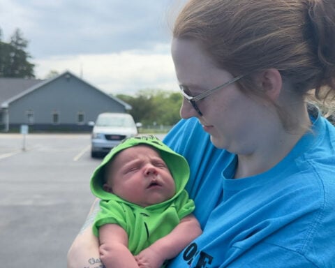 'I never actually imagined giving birth in a car': New mom searching for firefighter who helped deliver baby