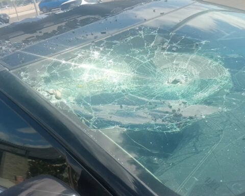 Mother struggles after inflatable display damages car during windstorm