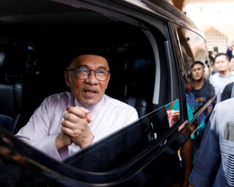 Malaysia PM Anwar under pressure amid growing defections from his party