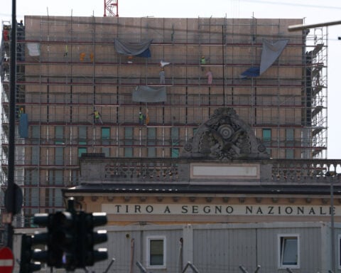 US consulate builder in Milan hit by court action over abuse allegations
