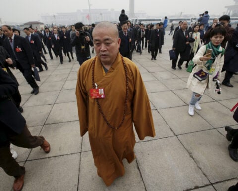 Former head of China's 'kung fu' temple sentenced to 24 years, state media reports