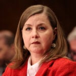 Fed officials mull raising rates to curb growing inflation risk