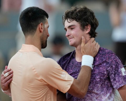 Djokovic’s 25th Slam bid ends in a grueling French Open loss to Brazilian teenager