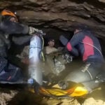 Rescuers pull four people trapped in flooded cave in Laos, Thai rescuers say