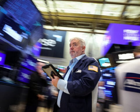 Wall St hovers near record highs as Nvidia, tech gains eclipse Iran war anxiety
