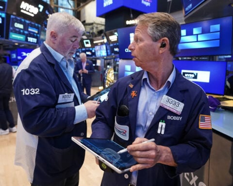 Wall Street inches to more records thanks to booming AI stocks