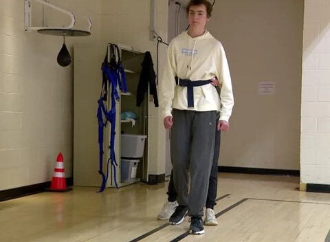 Teen walks graduation stage 1 year after suffering severe spinal cord injury