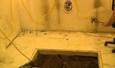 Four charged after suspected cartel tunnel found beneath store near Otay Mesa border crossing