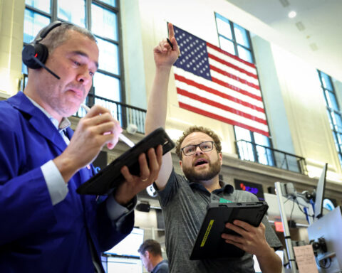 World stocks rally on AI optimism; jitters over Iran persist