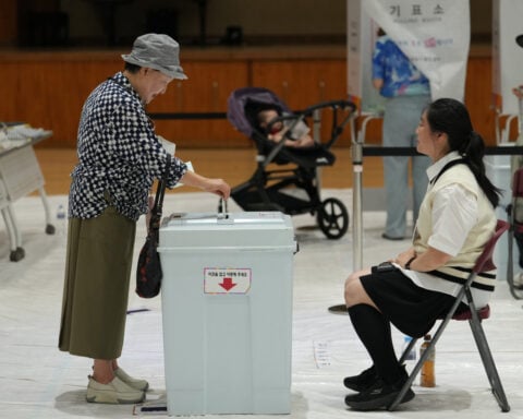 South Koreans vote in local elections seen as a gauge of support after President Lee's first year
