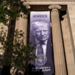 The Latest: Trump keeps immunity from tax probes while scrapping $1.8 billion compensation fund