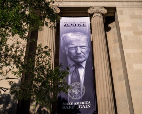 The Latest: Trump keeps immunity from tax probes while scrapping $1.8 billion compensation fund