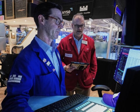 Oil prices climb back toward $100, and US stocks halt their record-breaking rally