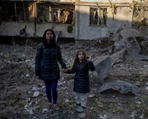 After narrow escape, air raid sirens spark panic for a Kyiv child