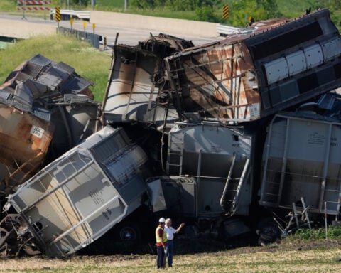 One dead and another injured after train strikes semi-truck in Iowa