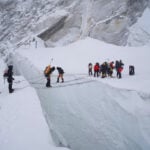 Sherpa guide missing for a week on Mount Everest rescued while crawling to base camp