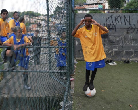 Brazilian players from a Rio de Janeiro favela find hope and opportunities thanks to soccer