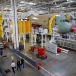 Qantas weighs order for 20 Boeing or Airbus wide-body jets, sources say