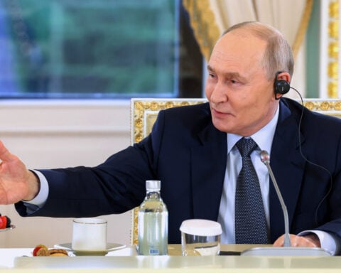 Putin says Russia will bolster its air defenses in response to Ukrainian drone attacks