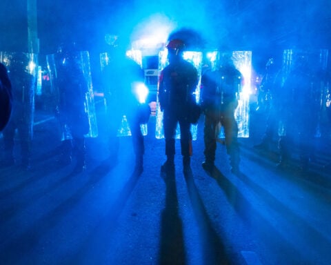 New Jersey police sergeant charged with stealing journalist's camera bag at immigration protest