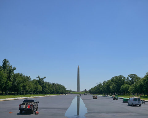 Water begins refilling Reflecting Pool after Trump's renovation to repaint it 'American flag blue'