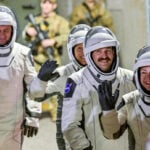 Who is aboard the International Space Station during the air leak?