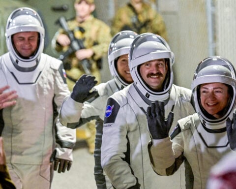 Who is aboard the International Space Station during the air leak?