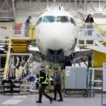 Airbus in limbo over early launch of larger A220, sources say
