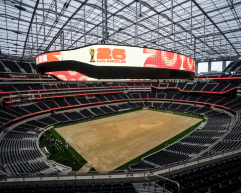 Stadium workers near Los Angeles vote to authorize a strike days before the World Cup begins