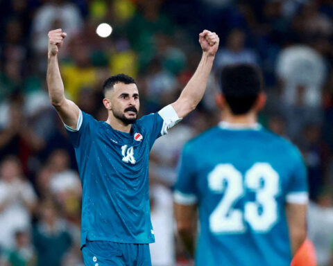 Soccer-Iraq World Cup striker Hussein questioned for hours at Chicago airport, source says