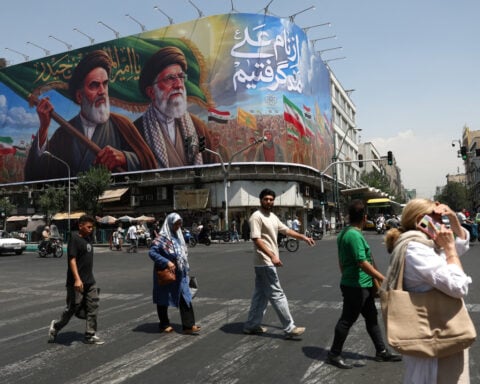 Israel strikes Beirut despite truce, Iranian lawmker threatens to retaliate
