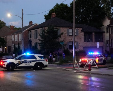 Search for suspects enters third day after 12 people shot near a festival in Toledo, Ohio
