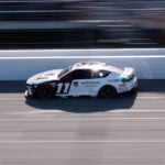 Denny Hamlin goes back to front again to win NASCAR race at Michigan, tie Kyle Busch on win list