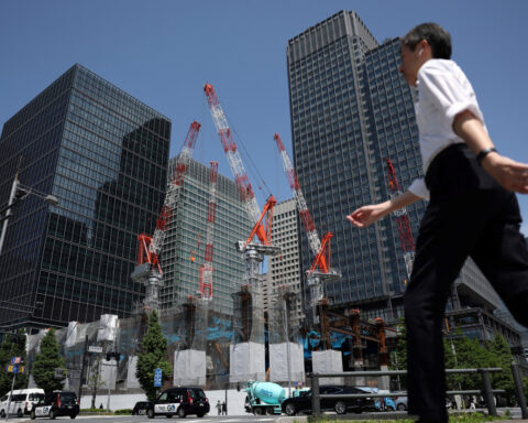 Japan's economy cools on weak capex in Q1, revised data shows