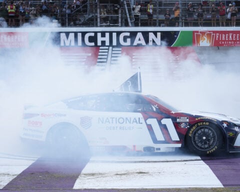 Denny Hamlin dedicates NASCAR victory at Michigan to Kyle Busch after tying him on career win list