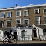 Reuters poll: UK home prices to rise less than previously thought on fears of higher borrowing costs