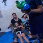 After morning of sirens, Israelis fall back into well-worn war routines