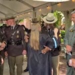 Maryland state troopers honor fallen colleague by supporting his daughter at high school graduation
