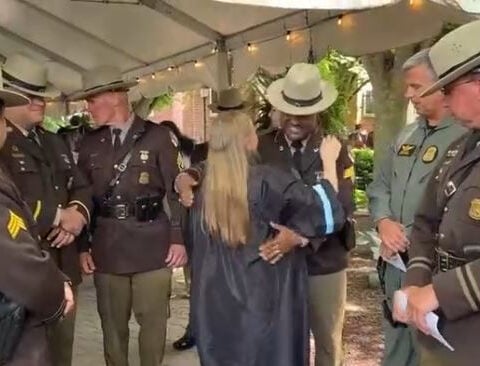 Maryland state troopers honor fallen colleague by supporting his daughter at high school graduation