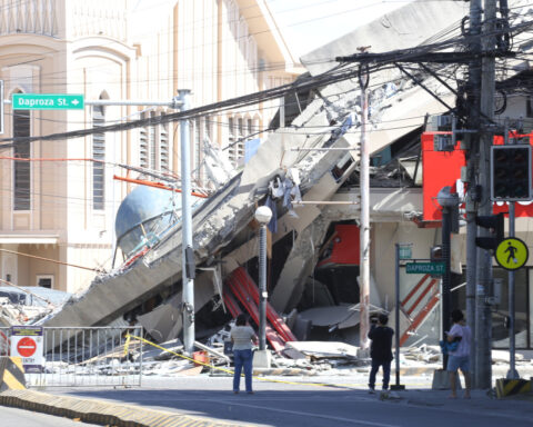 A 7.8 magnitude quake in the Philippines kills at least 35, collapses buildings and sparks tsunami