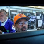 Wall St edges higher at open as chips extend gains, Middle East tensions ease