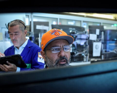 Wall St edges higher at open as chips extend gains, Middle East tensions ease