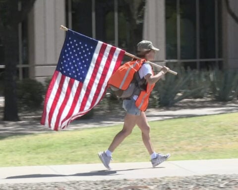 French woman walks America to honor the flag discovered in her father's pocket