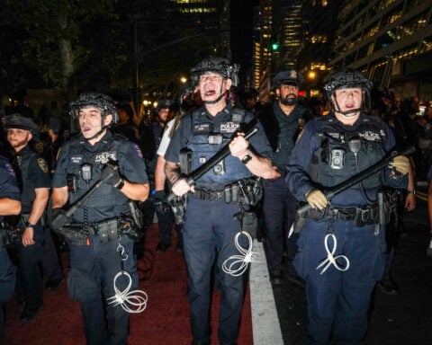 A 'rowdy' Knicks watch party ends with 21 in custody and 5 officers injured