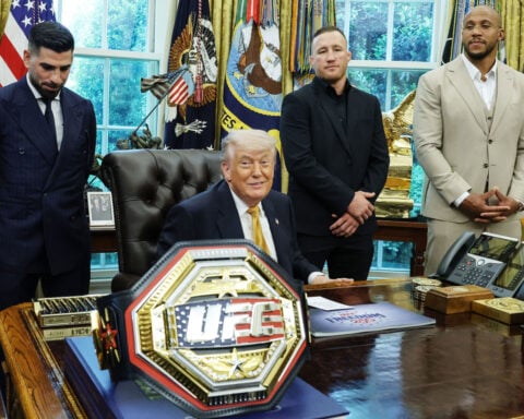 Trump family promotes coins commemorating White House UFC fight