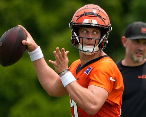 Bengals restructure Joe Burrow's contract to free up cap space, AP source says