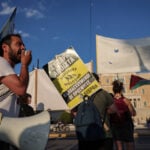 Greece approves quicker migrant returns, aims to set up return hubs