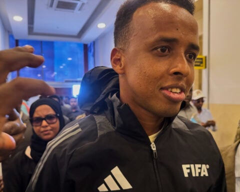 Somali World Cup referee denied entry to US arrives home to hero's welcome