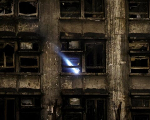 Hong Kong authorities charge seven people, two companies over deadly fire
